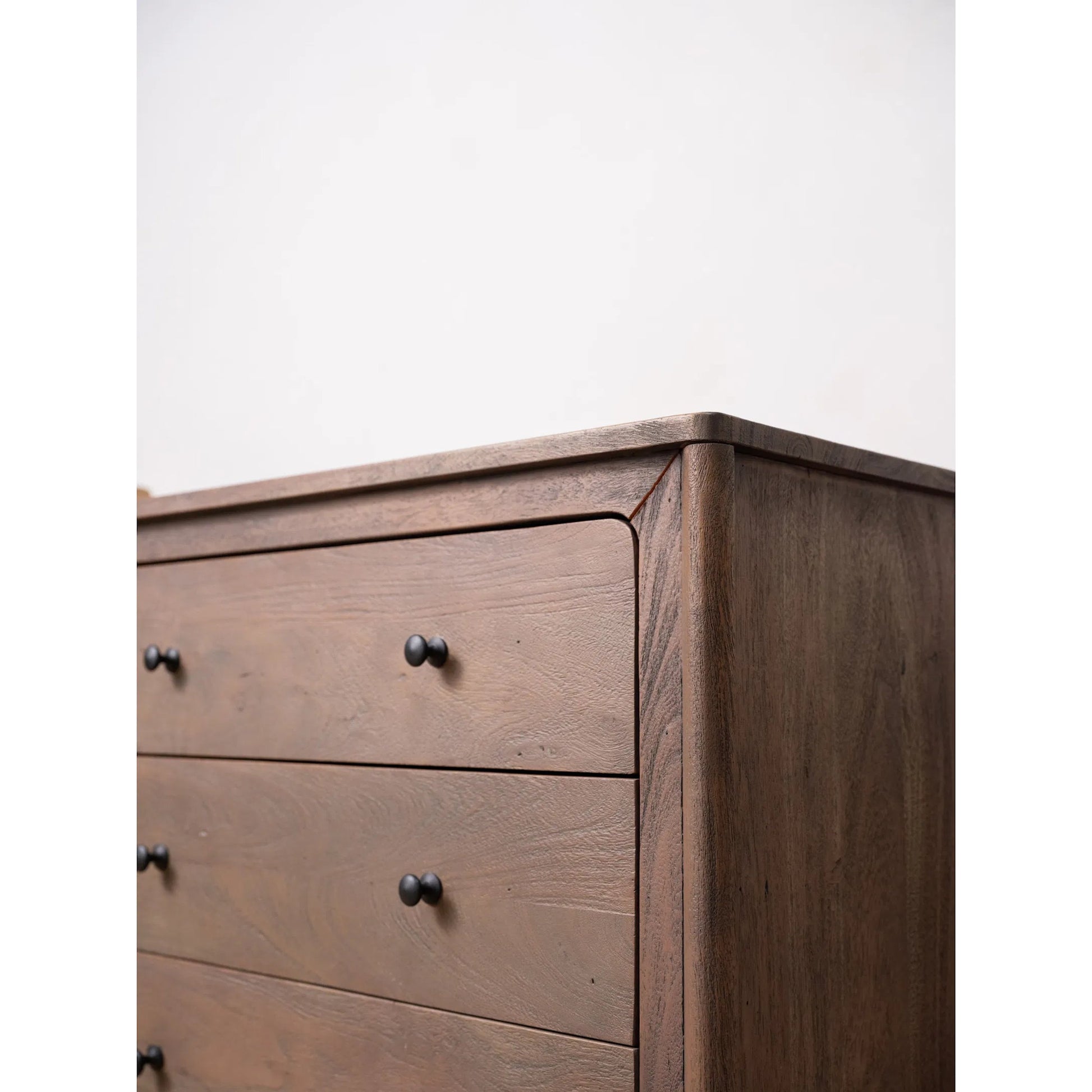 Mabel 6 Drawer Dresser by Moe's Home Collection in dark brown. Made from entire structure, drawer front, solid acacia wood, drawer acacia veneer over mdf in a unique style.
