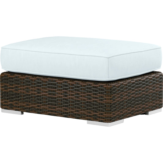 Montecito Outdoor Ottoman by Sunset West in cognac. Made from resin wicker in a modern style.
