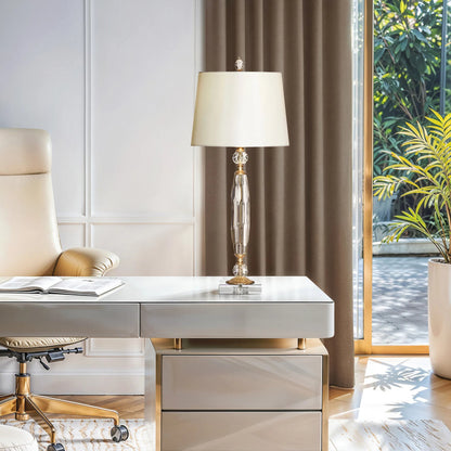 Madalene Lamp by Bradburn Home. Made from crystal, brass in a unique style.