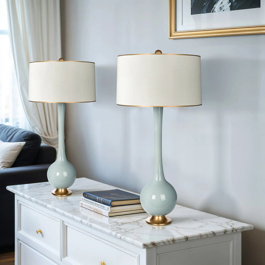 Lela Blue Lamp by Bradburn Home. Made from ceramic in a unique style.