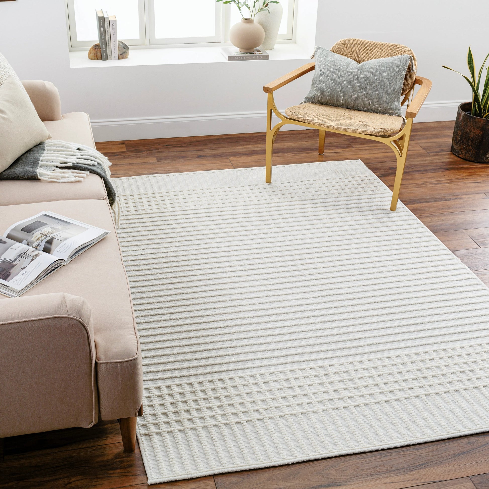 Lyna Rug by Livabliss in white, off-white. Made from main: 70% polypropylene, main: 30% polyester in a modern style.