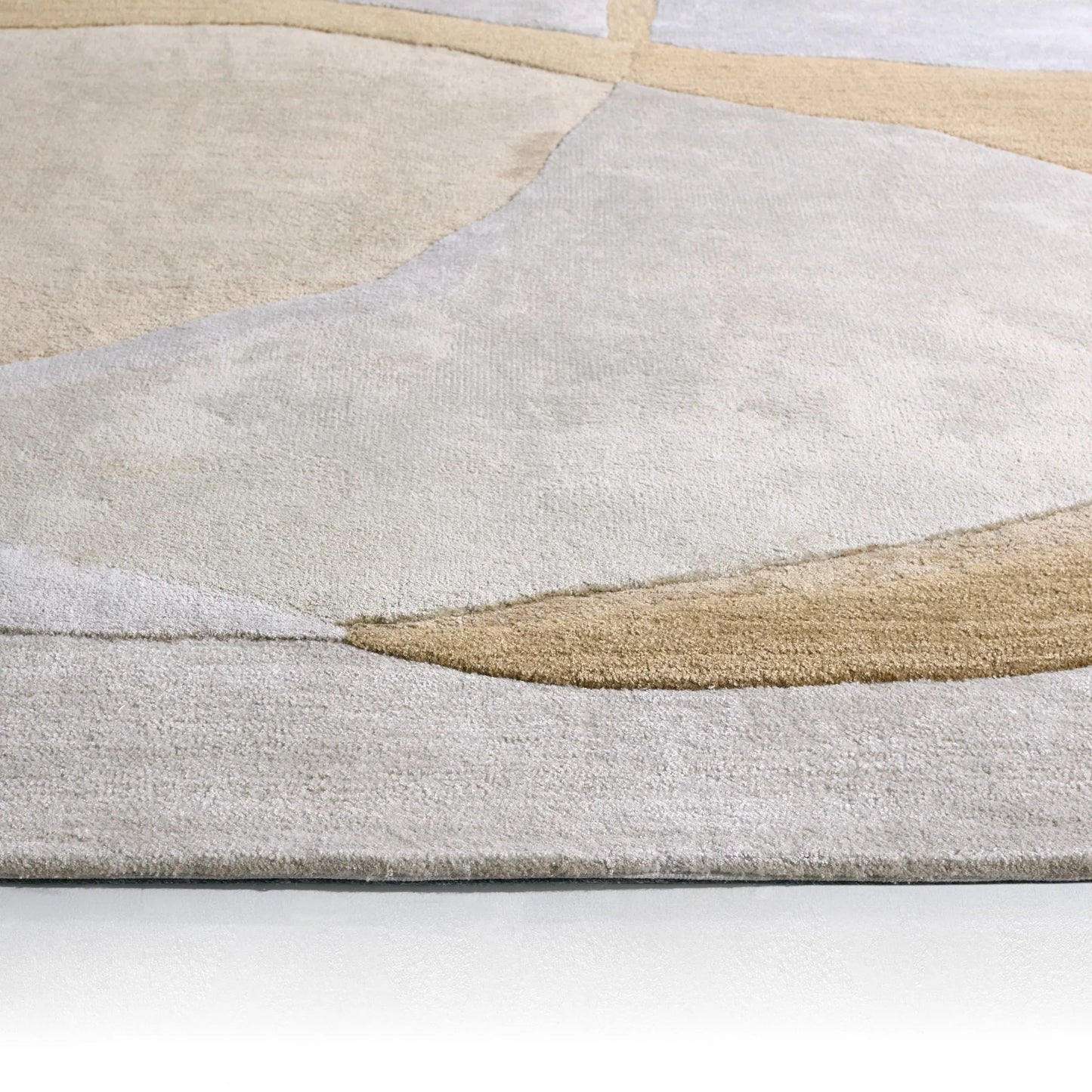 003 SI-2531324,SI-2531325,SI-2531326,SI-2531327,SI-2531328,SI-2531329 | Closeup | Layered Form​ LYD01 Rug by Jaipur Living in ivory, white, yellow, gold. Made from 65% viscose 35% wool in a unique style.