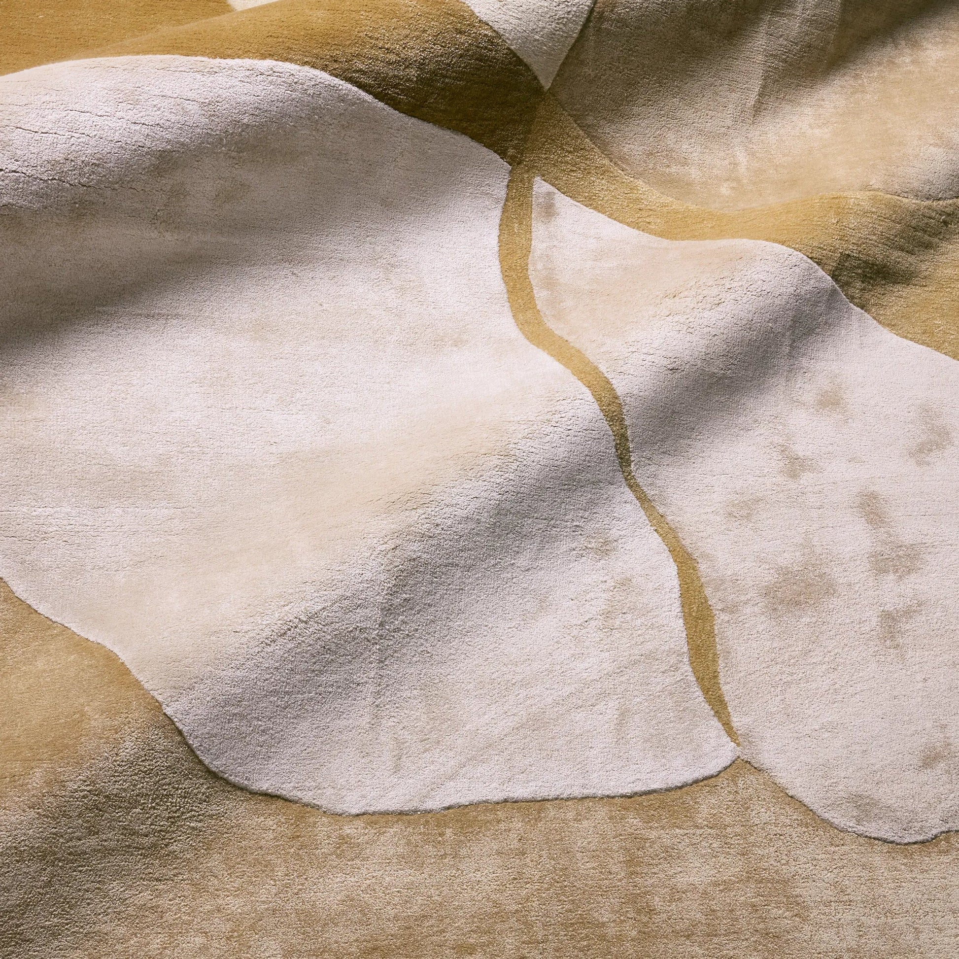 Layered Form​ LYD01 Rug by Jaipur Living in ivory, white, yellow, gold. Made from 65% viscose 35% wool in a unique style.