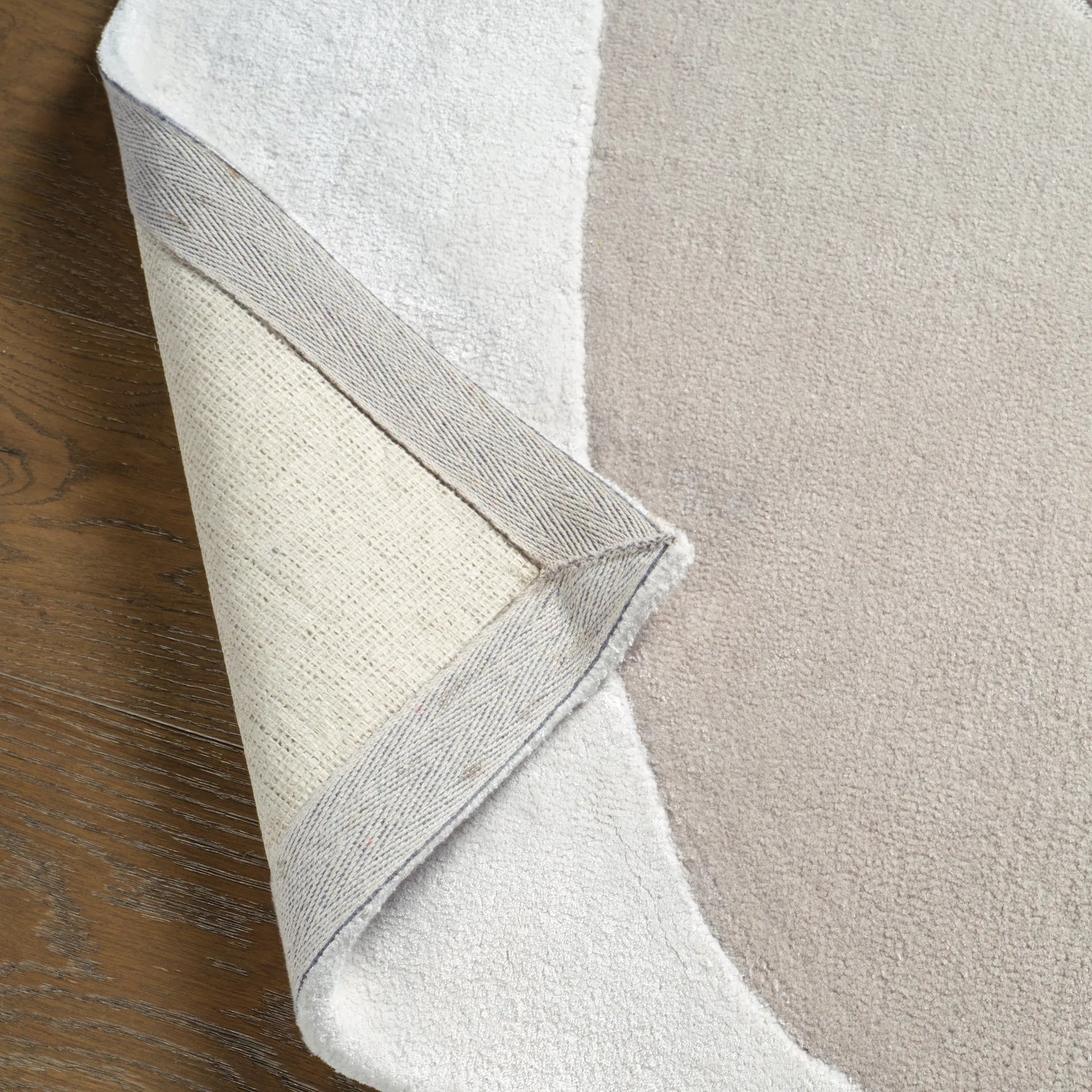 Layered Form​ LYD02 Rug by Jaipur Living in ivory, white, tan, beige. Made from 65% viscose 35% wool in a unique style.
