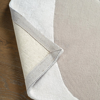 Layered Form​ LYD02 Rug by Jaipur Living in ivory, white, tan, beige. Made from 65% viscose 35% wool in a unique style.