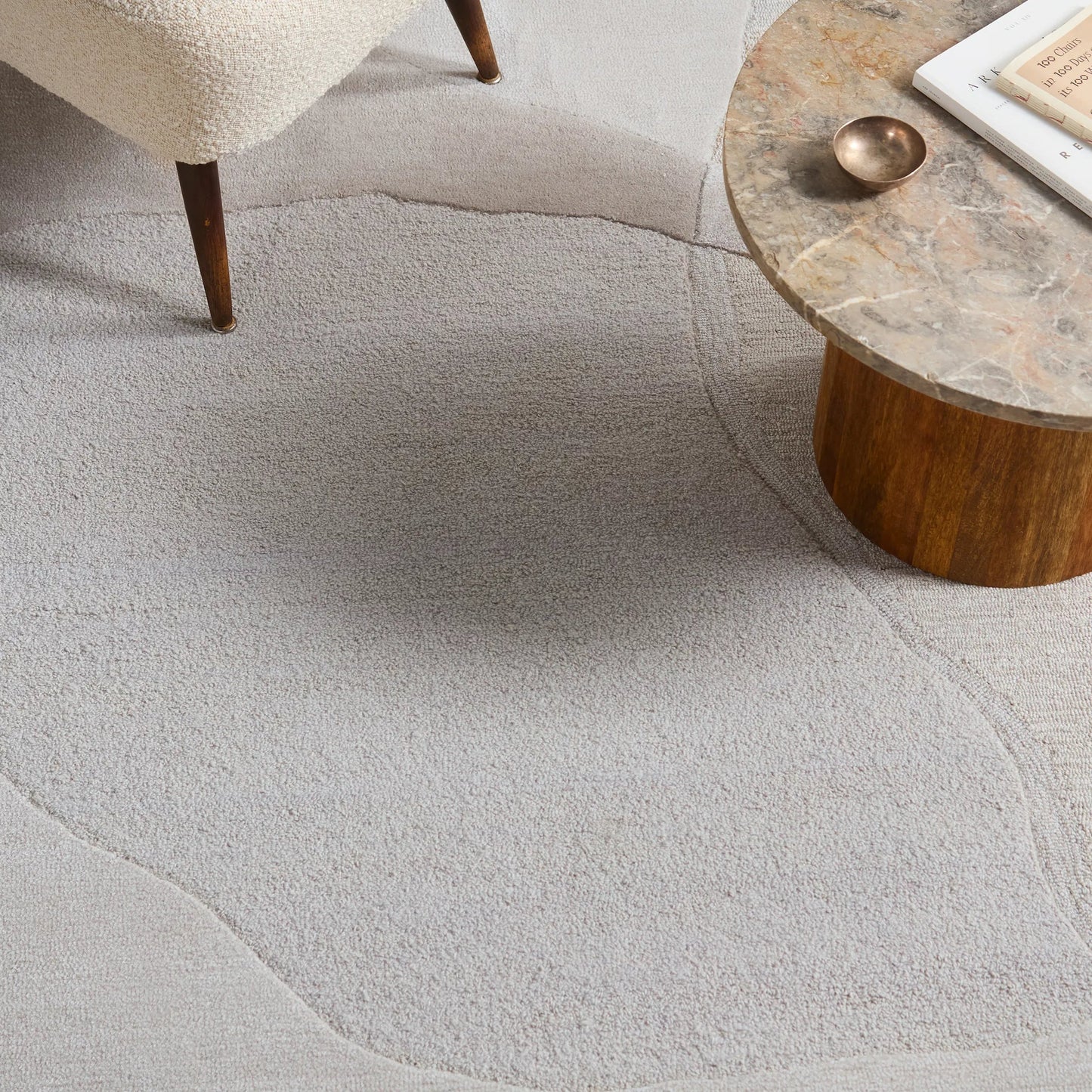 005 SI-2531330,SI-2531331,SI-2531332,SI-2531333,SI-2531334,SI-2531335 | Closeup | Layered Form​ LYD02 Rug by Jaipur Living in ivory, white, tan, beige. Made from 65% viscose 35% wool in a unique style.