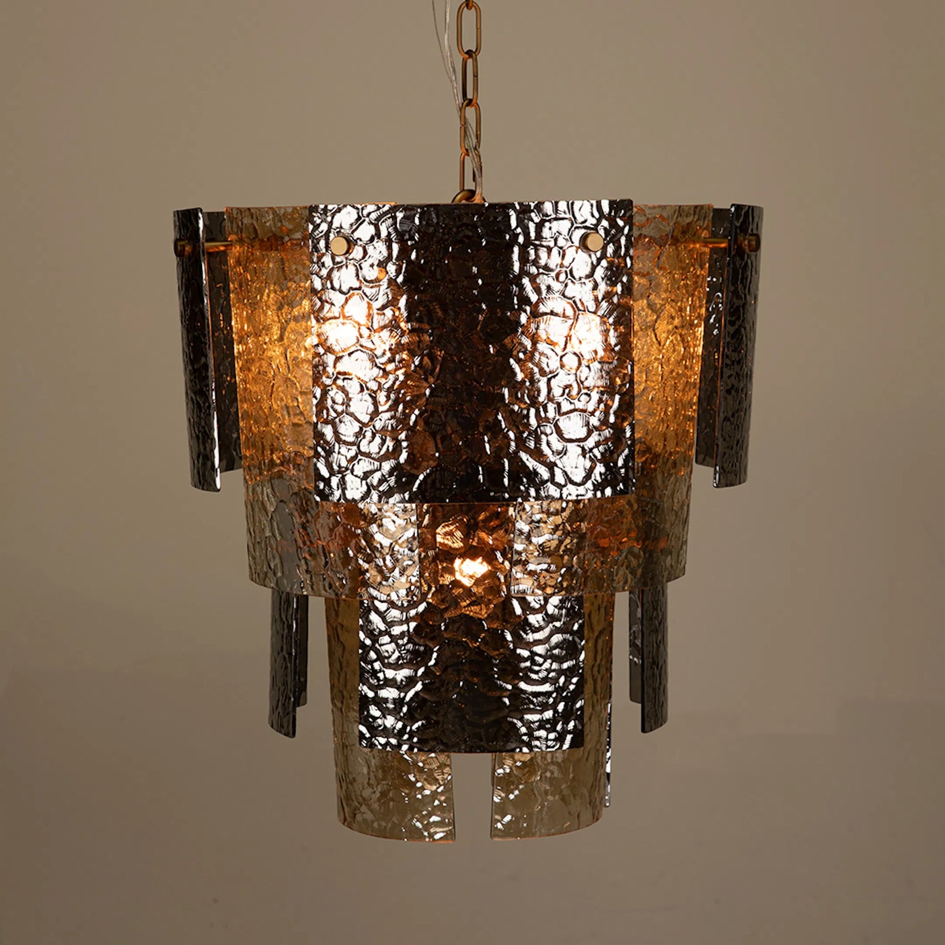 Cornelius Chandelier by Noir in antique brass. Made from iron, smoke grey glass in a traditional style.