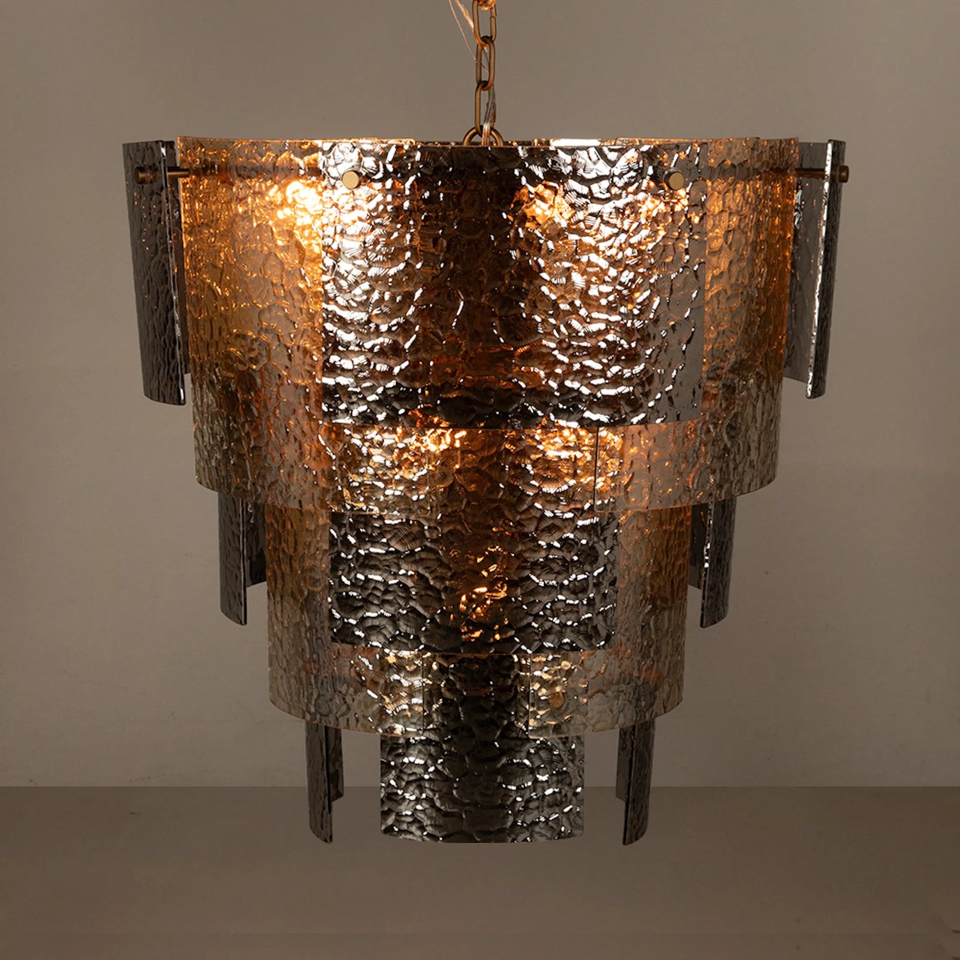 Cornelius Chandelier by Noir in antique brass. Made from iron, smoke grey glass in a traditional style.
