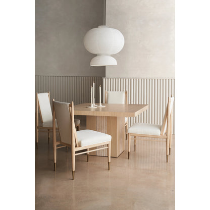 Unity Light Dining Table by Caracole in oa and sun drenched oak. Made from asian hardwood, stone, oak in a modern style.