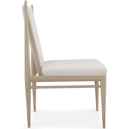 Unity Light Dining Chair by Caracole in ivory and sun drenched oak. Made from oak in a modern style.