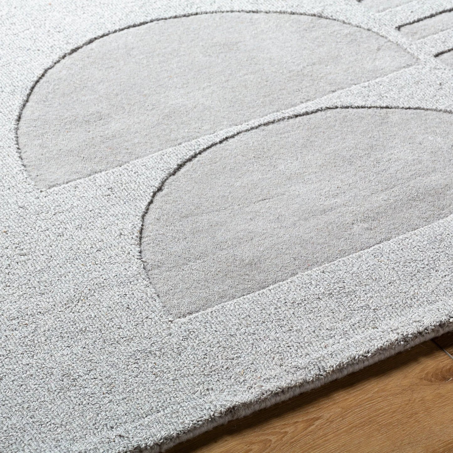 005 SI-2131611,SI-2131612,SI-2131613,SI-2131614 | Closeup | Mystique Rug - 484935 by Livabliss in taupe, stone grey, charcoal. Made from face: 100% wool, warp: 100% cotton in a unique style.