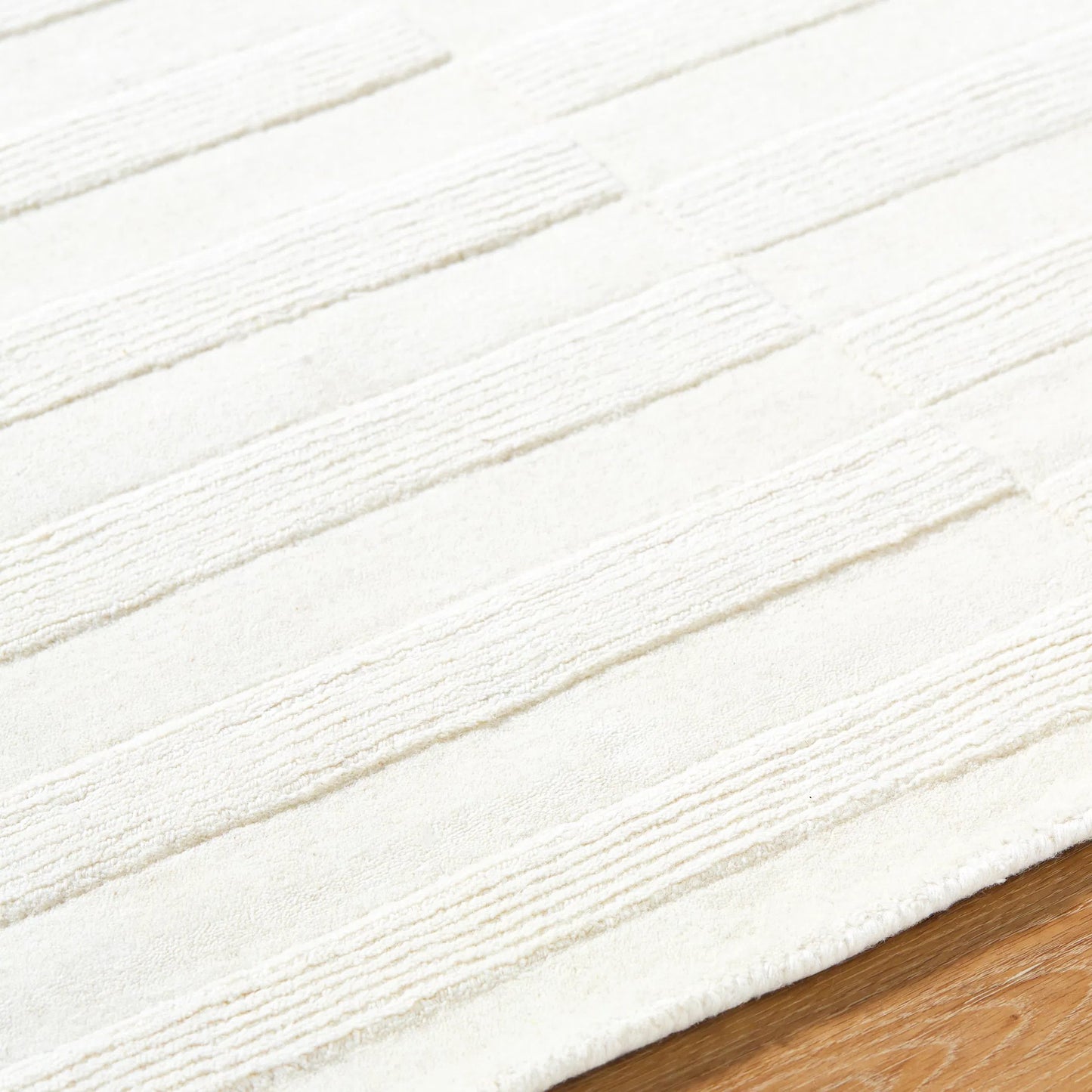 005 SI-2167686,SI-2167687,SI-2167688,SI-2167689 | Closeup | Mystique Rug - 489220 by Livabliss in ivory, cream, beige. Made from wool in a unique style.