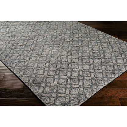 Malaga Rug by Surya in ink blue, denim, light sage, light olive, dark brown. Made from 90% wool, 10% polyester in a transitional style.