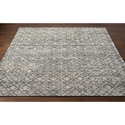 Malaga Rug by Surya in ink blue, denim, light sage, light olive, dark brown. Made from 90% wool, 10% polyester in a transitional style.