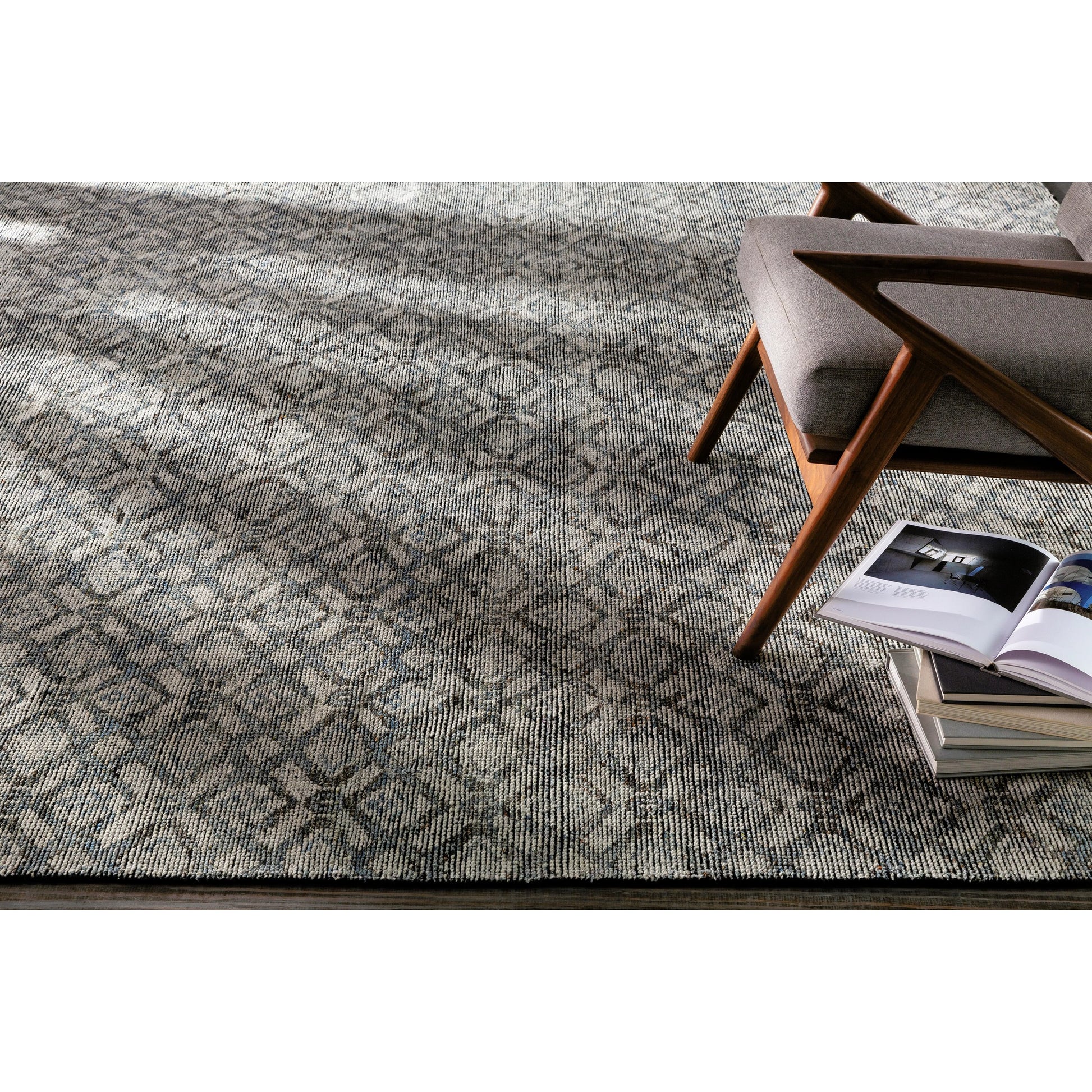 Malaga Rug by Surya in ink blue, denim, light sage, light olive, dark brown. Made from 90% wool, 10% polyester in a transitional style.