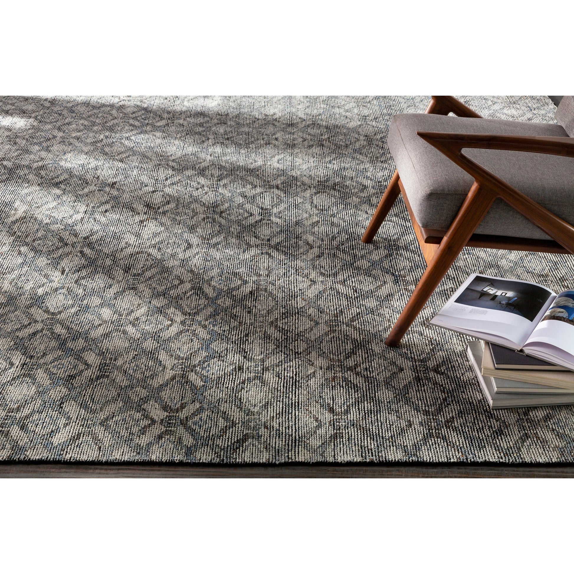 Malaga Rug by Surya in ink blue, denim, light sage, light olive, dark brown. Made from 90% wool, 10% polyester in a transitional style.