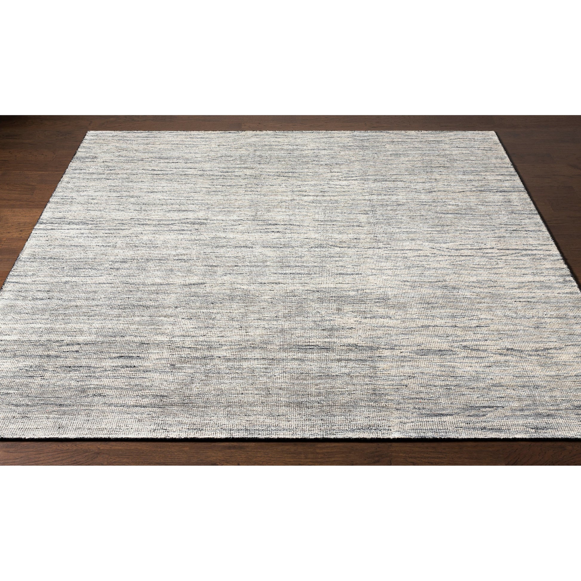 Malaga Rug - 26054 by Surya in ink blue, denim, light sage, light olive. Made from 90% wool, 10% polyester in a unique style.