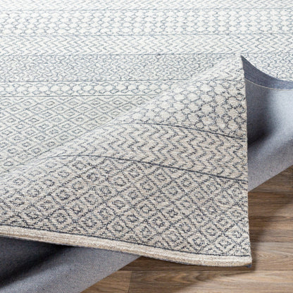 Maroc Rug by Livabliss in light beige, oatmeal, charcoal, black. Made from unique in