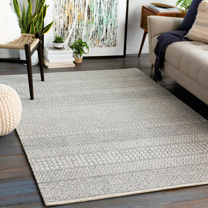 Maroc Rug by Livabliss in light beige, oatmeal, charcoal, black. Made from unique in a unique style.