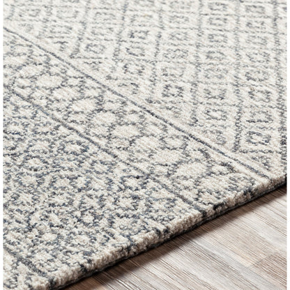 Maroc Rug by Livabliss in light beige, oatmeal, charcoal, black. Made from unique in