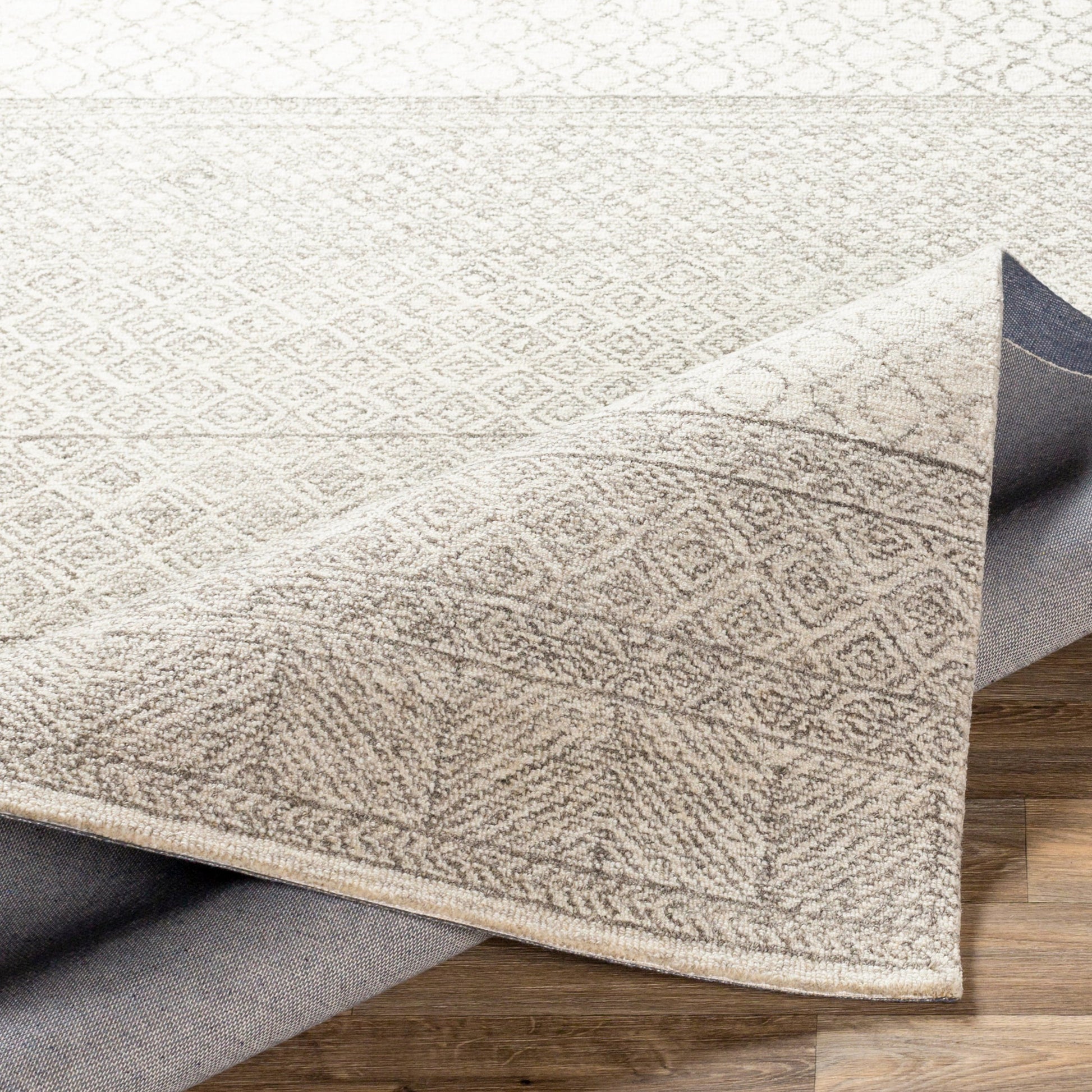 Lustro Rug by Livabliss in ivory, gray, medium gray, dark brown. Made from unique in a modern style.