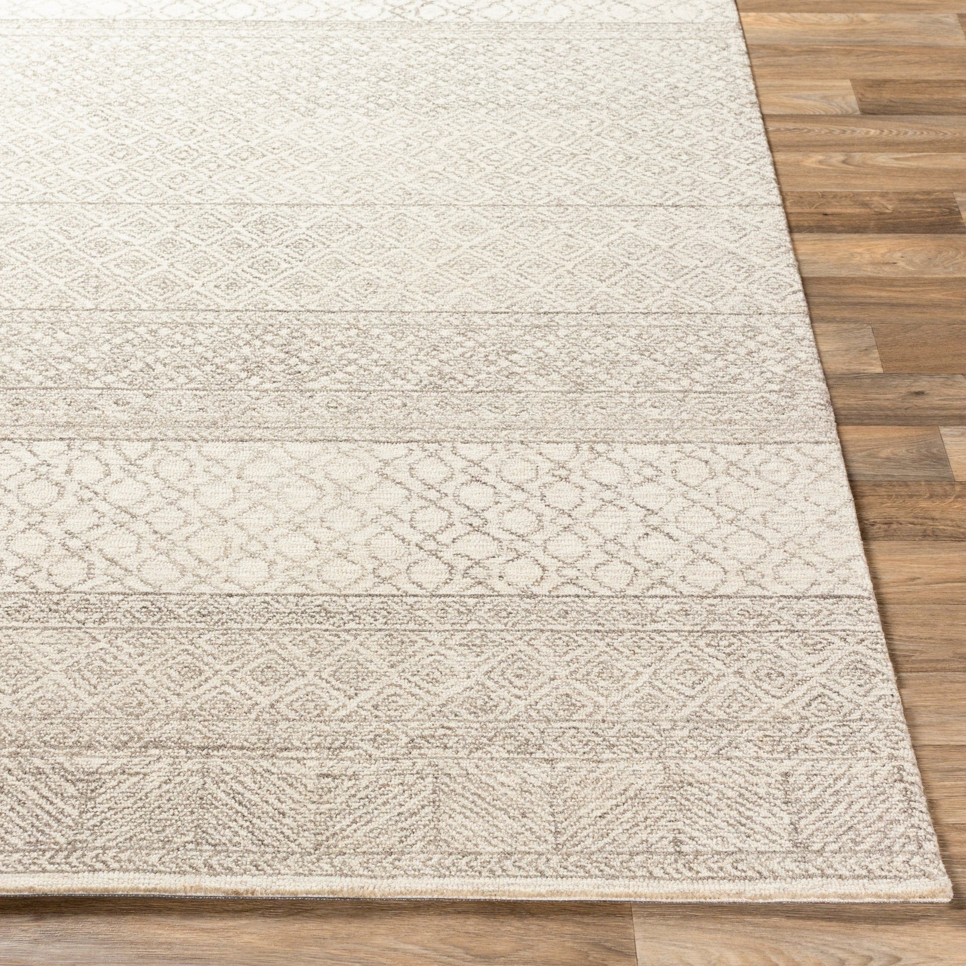 Lustro Rug by Livabliss in ivory, gray, medium gray, dark brown.