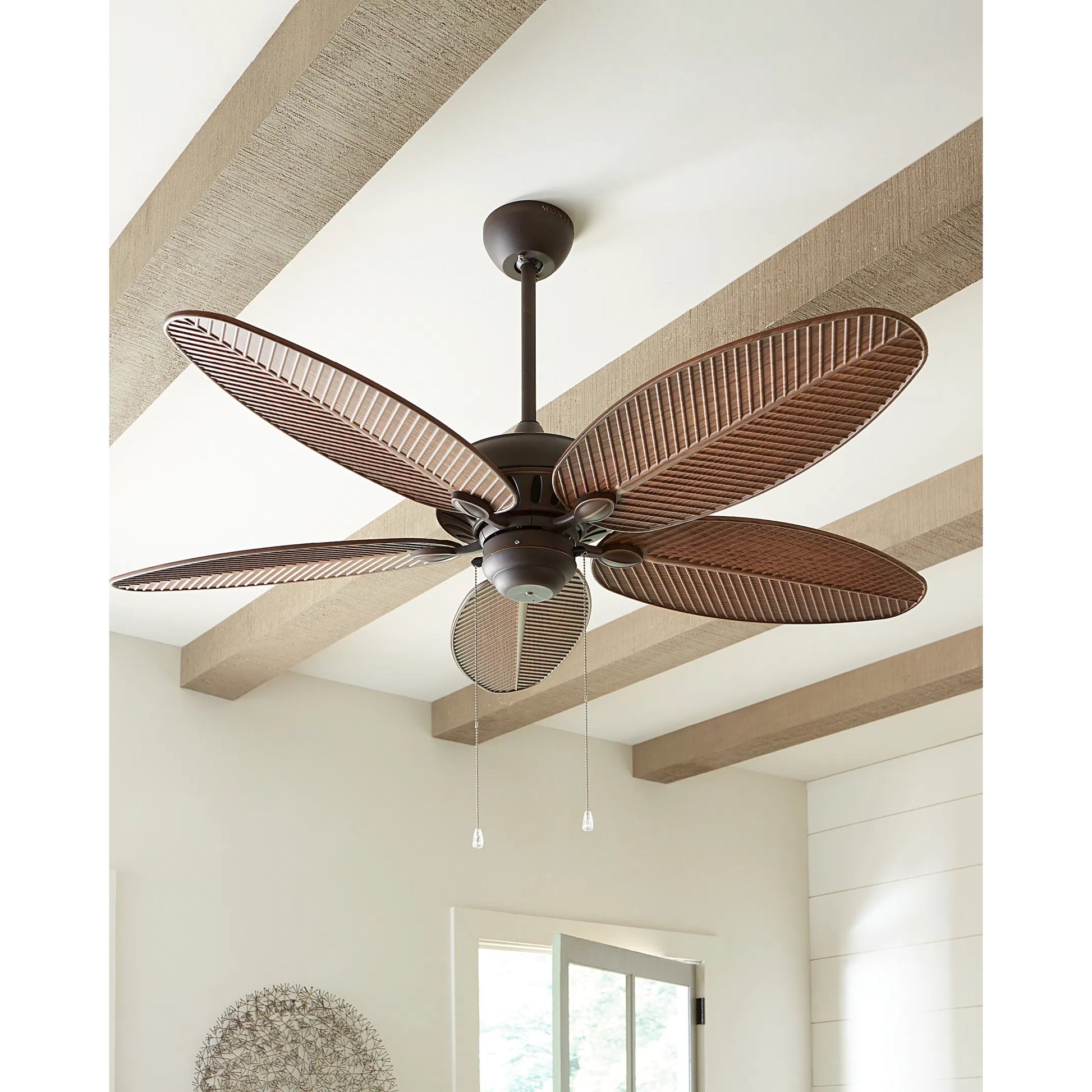 Cruise Palm Leaf Outdoor Fan by Monte Carlo. Made from unique in a coastal style.