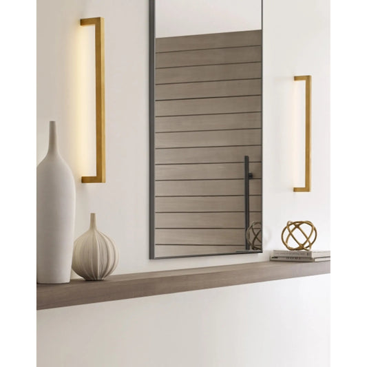 Stagger Small Wall Sconce by Visual Comfort & Co.. Made from aluminum or brass in a unique style.