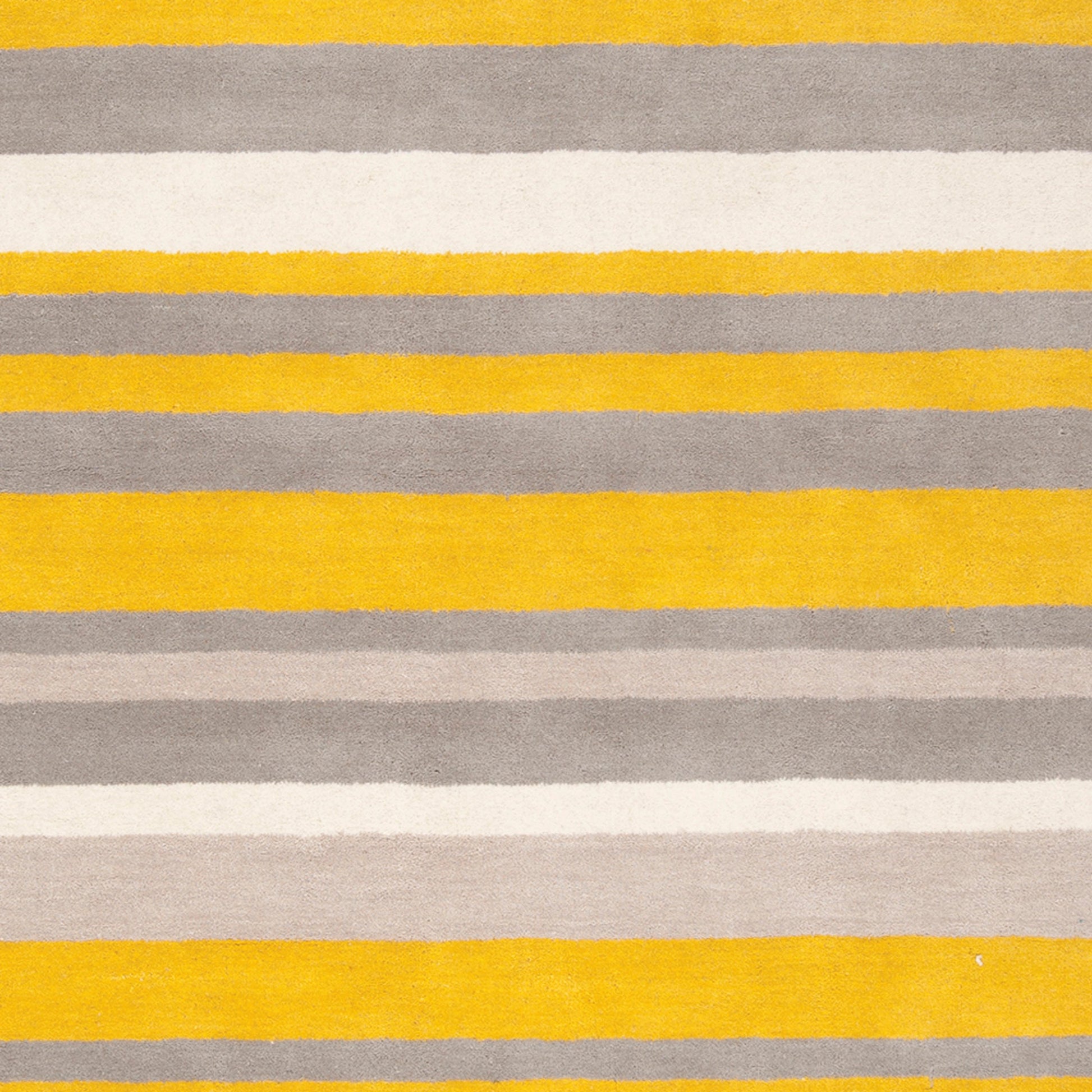 Madison Square Rug - 555 by Surya in citrine, parchment. Made from 100% wool in a unique style.