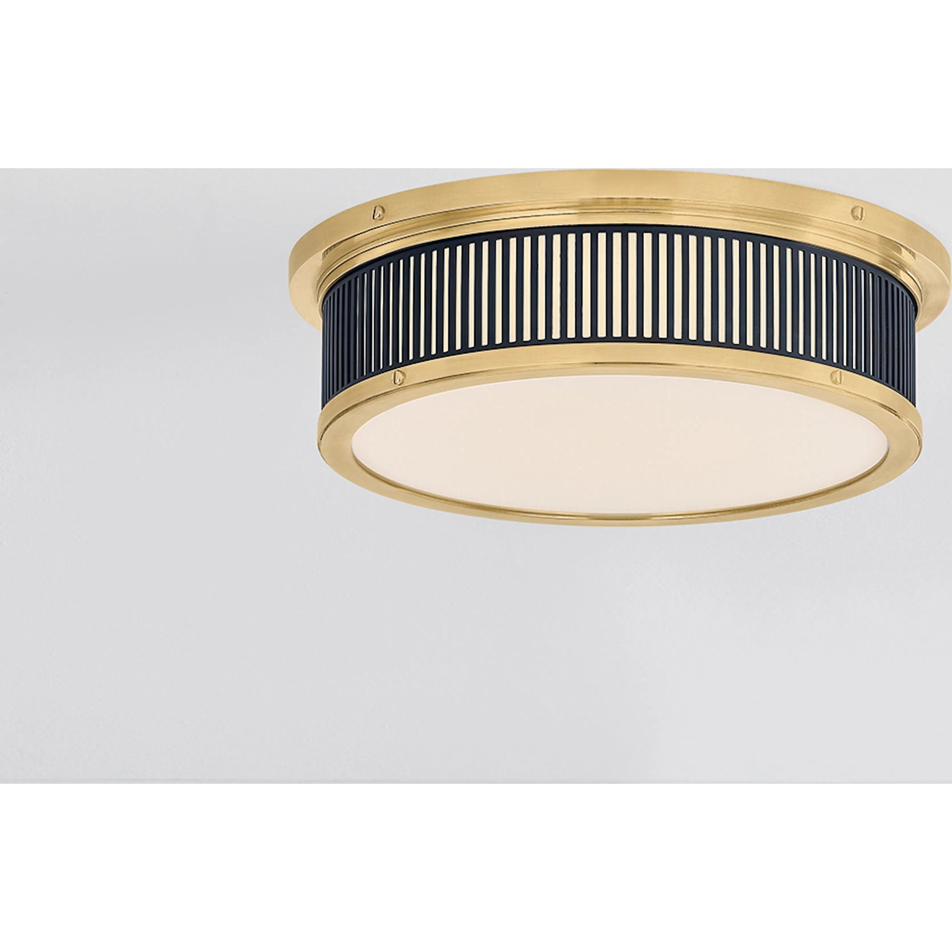 Ashdown Round Flush Mount by Hudson Valley. Made from brass in a unique style.