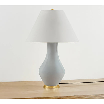 Hanslope Table Lamp by Hudson Valley in aged brass, ceramic french muslin. Made from ceramic in a unique style.