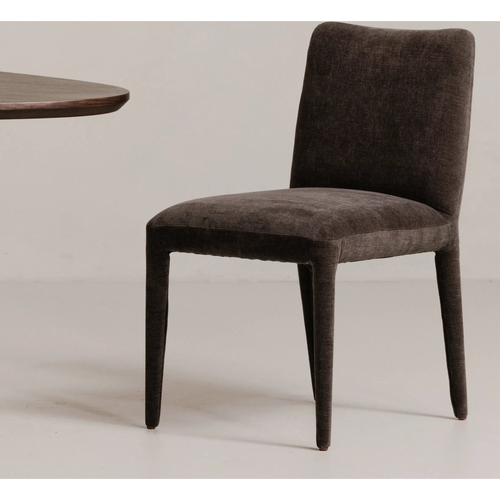 Calla Dining Chair (Set of 2) by Moe's Home Collection in brown. Made from top grain leather, ash wood frame, rubber wood legs in a modern style.