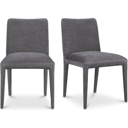 Calla Dining Chair (Set of 2) by Moe's Home Collection in brown. Made from top grain leather, ash wood frame, rubber wood legs in a modern style.