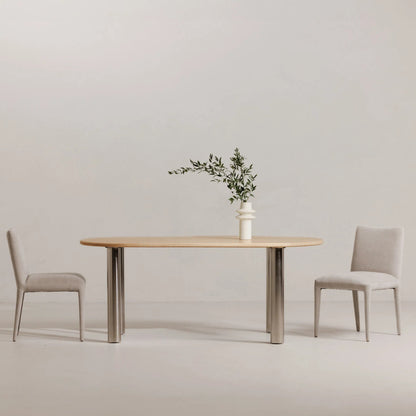 Calla Dining Chair (Set of 2) by Moe's Home Collection in brown. Made from top grain leather, ash wood frame, rubber wood legs in a modern style.