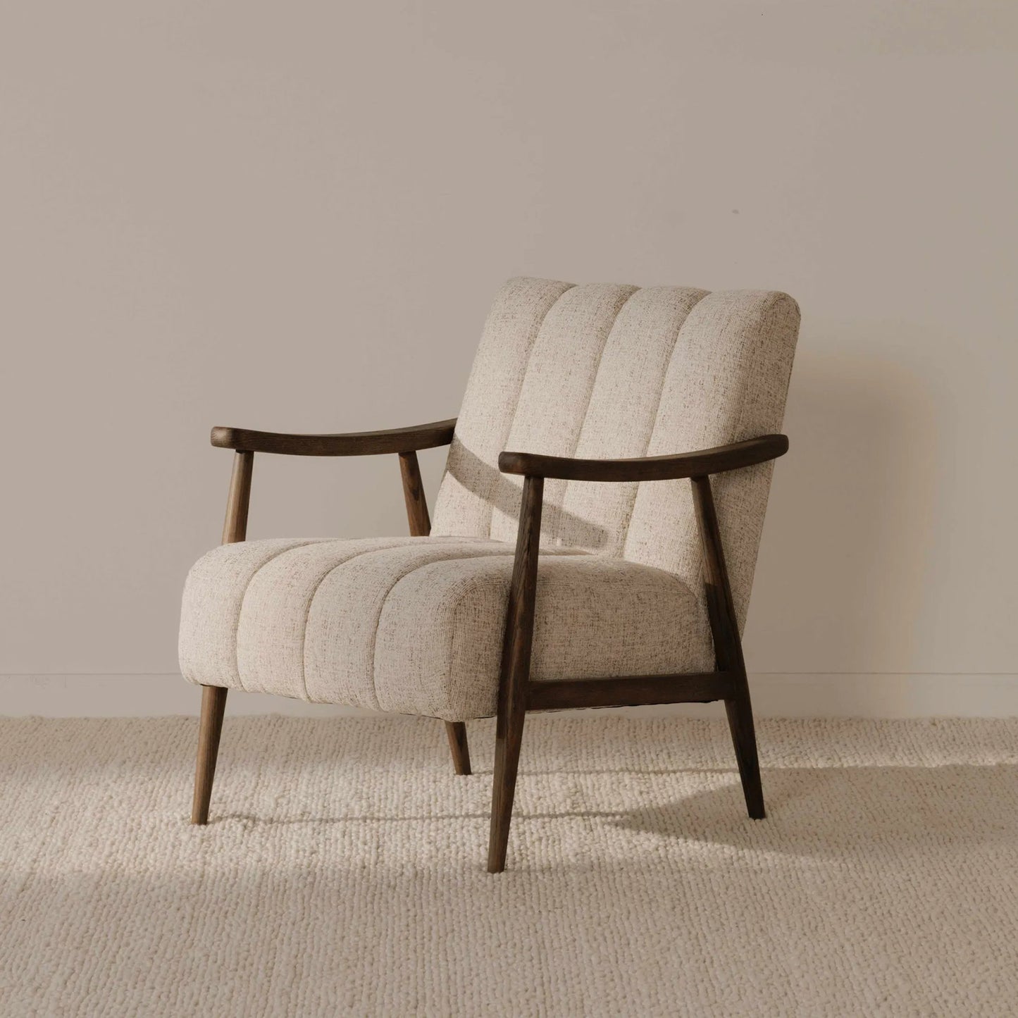 012 SI-2253607 | Lifestyle | Aster Accent Chair by Moe's Home Collection in pebbled beige. Made from upholstery: 93% polyester, 7% acrylic, solid oak frame, plywood frame, foam seat in a transitional style.