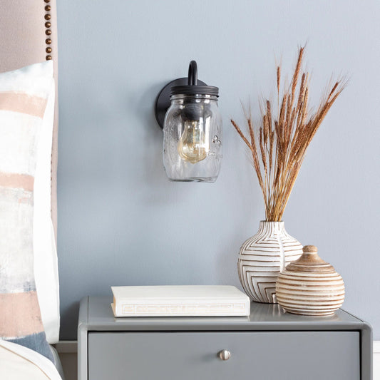 Melanie Wall Sconce - 24034 by Surya in black and painted. Made from glass, metal in a modern style.