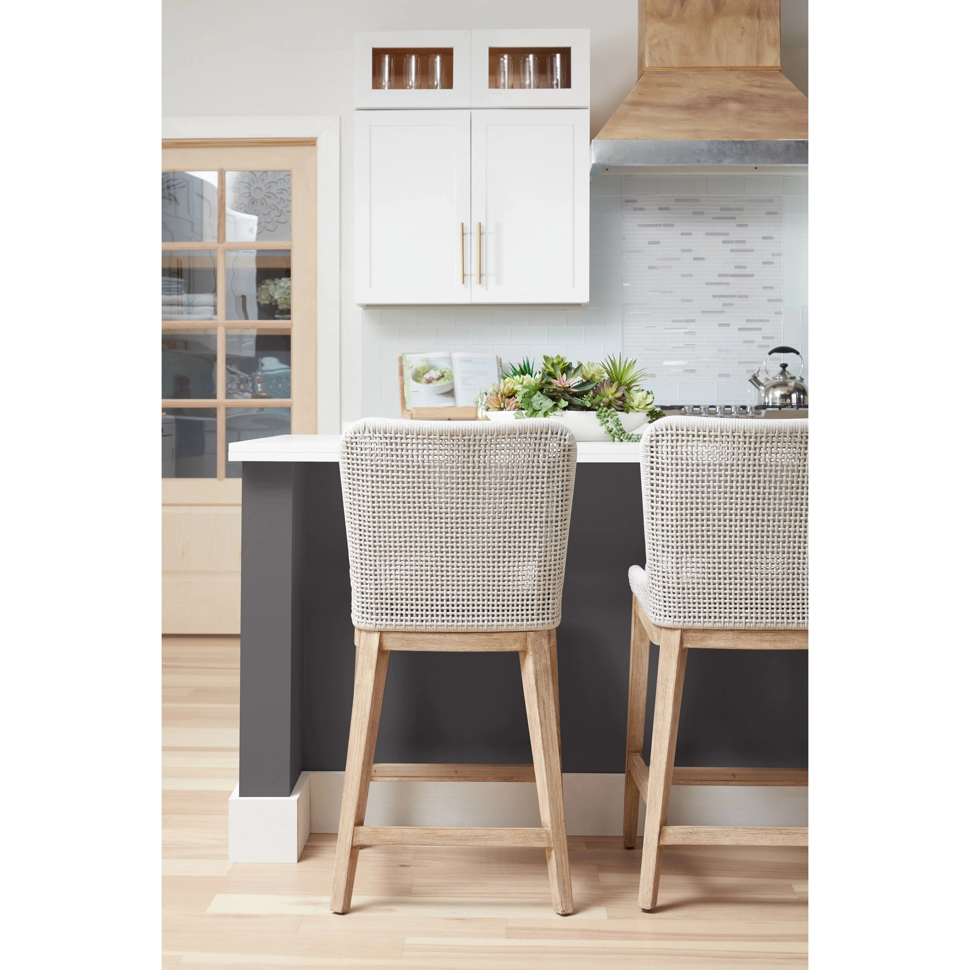 Mesh Counter Stool by Essentials For Living in natural gray mahogany, white speckle. Made from solid mahogany wood, aluminum, polyolefin rope, 100% olefin fabric, foam in a coastal style.
