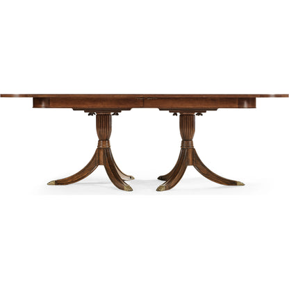 Windsor Regency Two-Leaf Mahogany Dining Table by Jonathan Charles in brown and medium antique mahogany. Made from acacia in a traditional style.