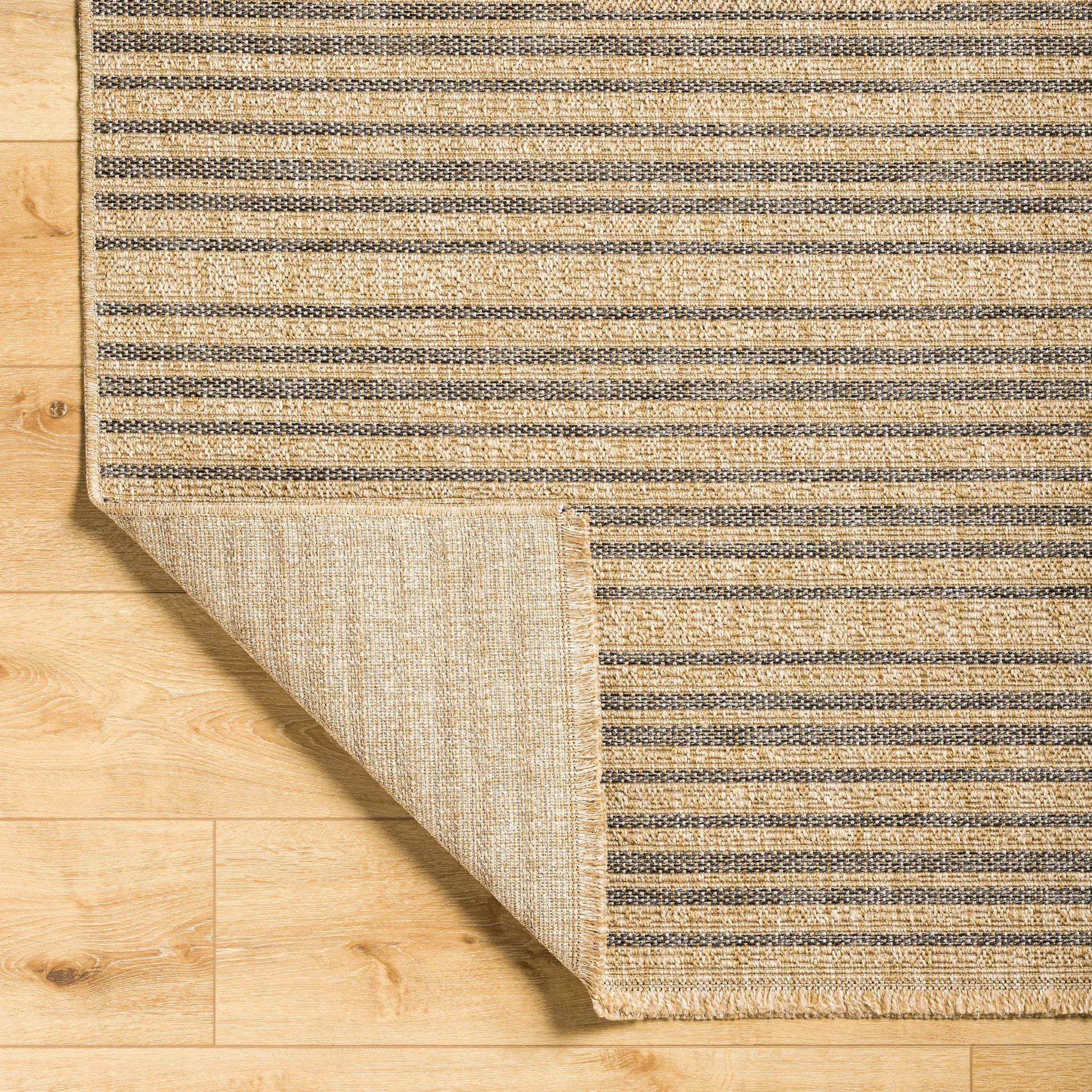 Mirage MGE-2308 Indoor/Outdoor Rug by Livabliss in tan, black. Made from 100% polypropylene in a unique style.