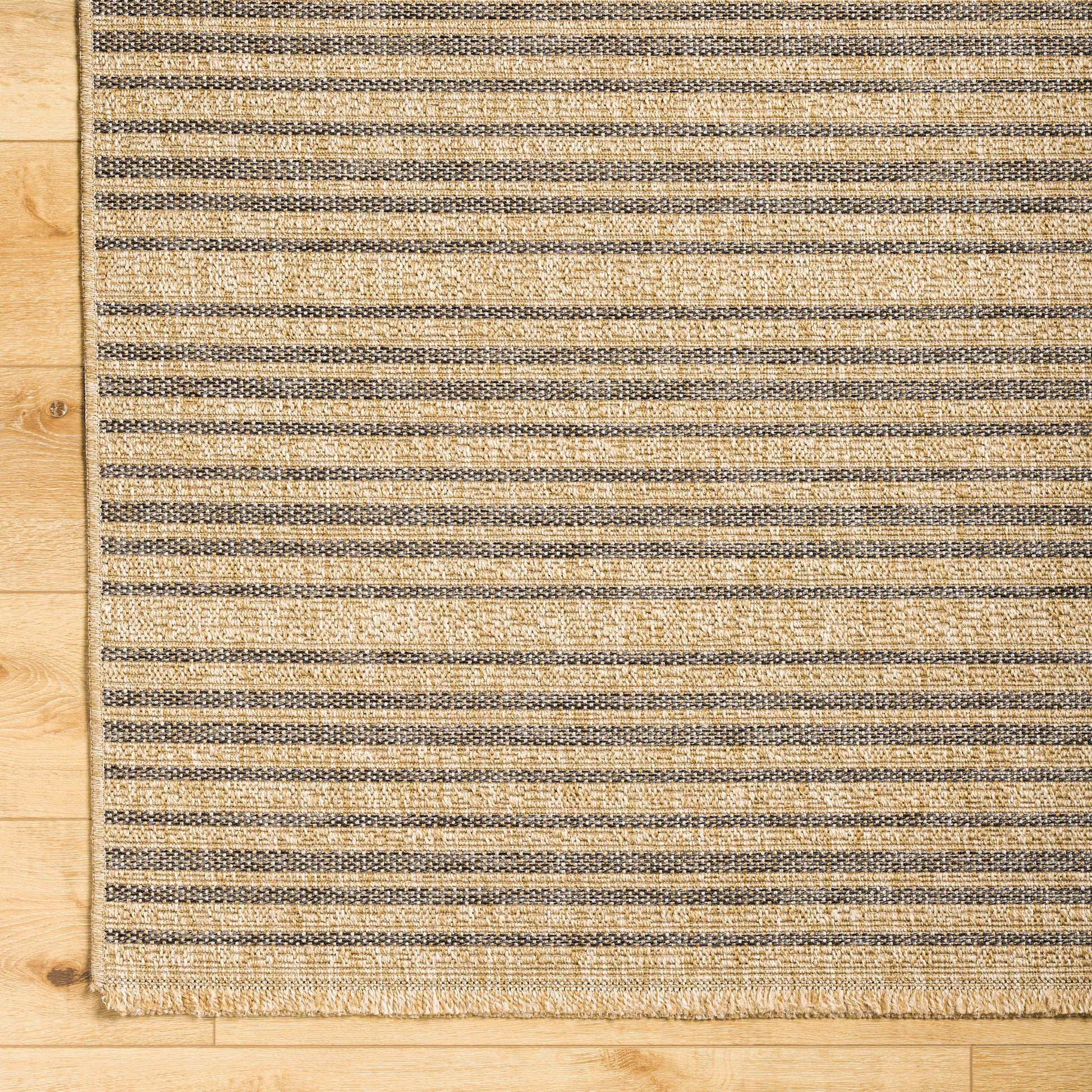 Mirage MGE-2308 Indoor/Outdoor Rug by Livabliss in tan, black. Made from 100% polypropylene in a unique style.