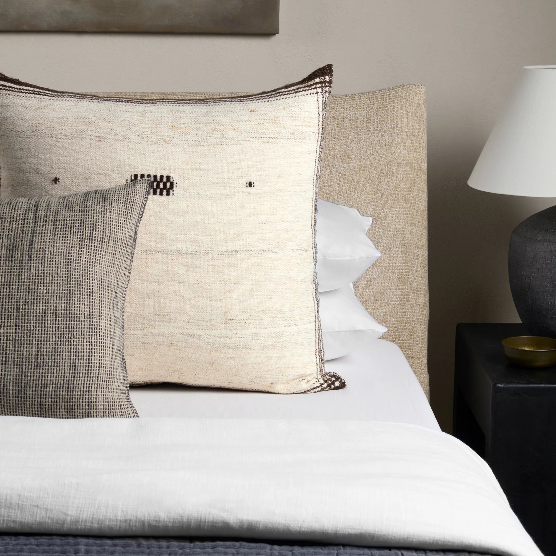 Margosa MGP02 Pillow by Jaipur Living in natural, black. Made from 40% cotton 40% wool 20% silk in a modern style.