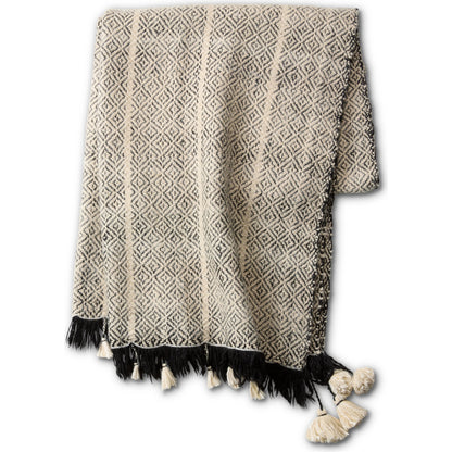 Margosa Primani Throw by Jaipur Living in gray, cream. Made from 100% wool in a cottage & farmhouse style.