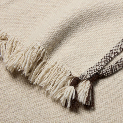 Margosa MGT06 Throw by Jaipur Living in cream, brown. Made from 100% wool in a modern style.