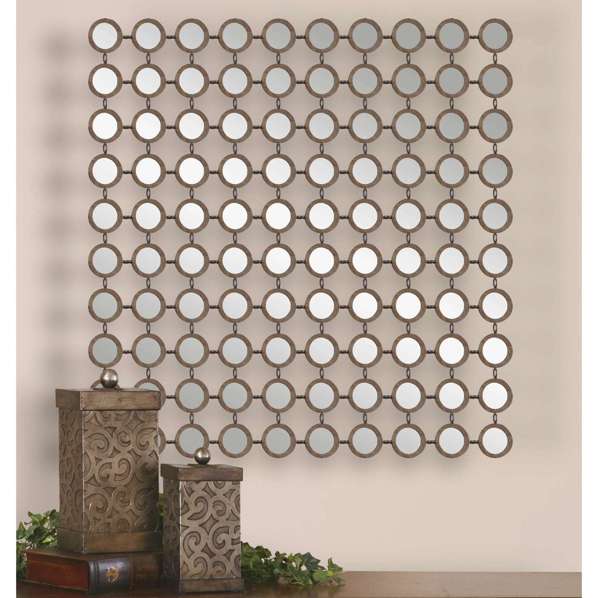 Dinuba Champagne Mirror by Uttermost in silver. Made from metal in a modern style.