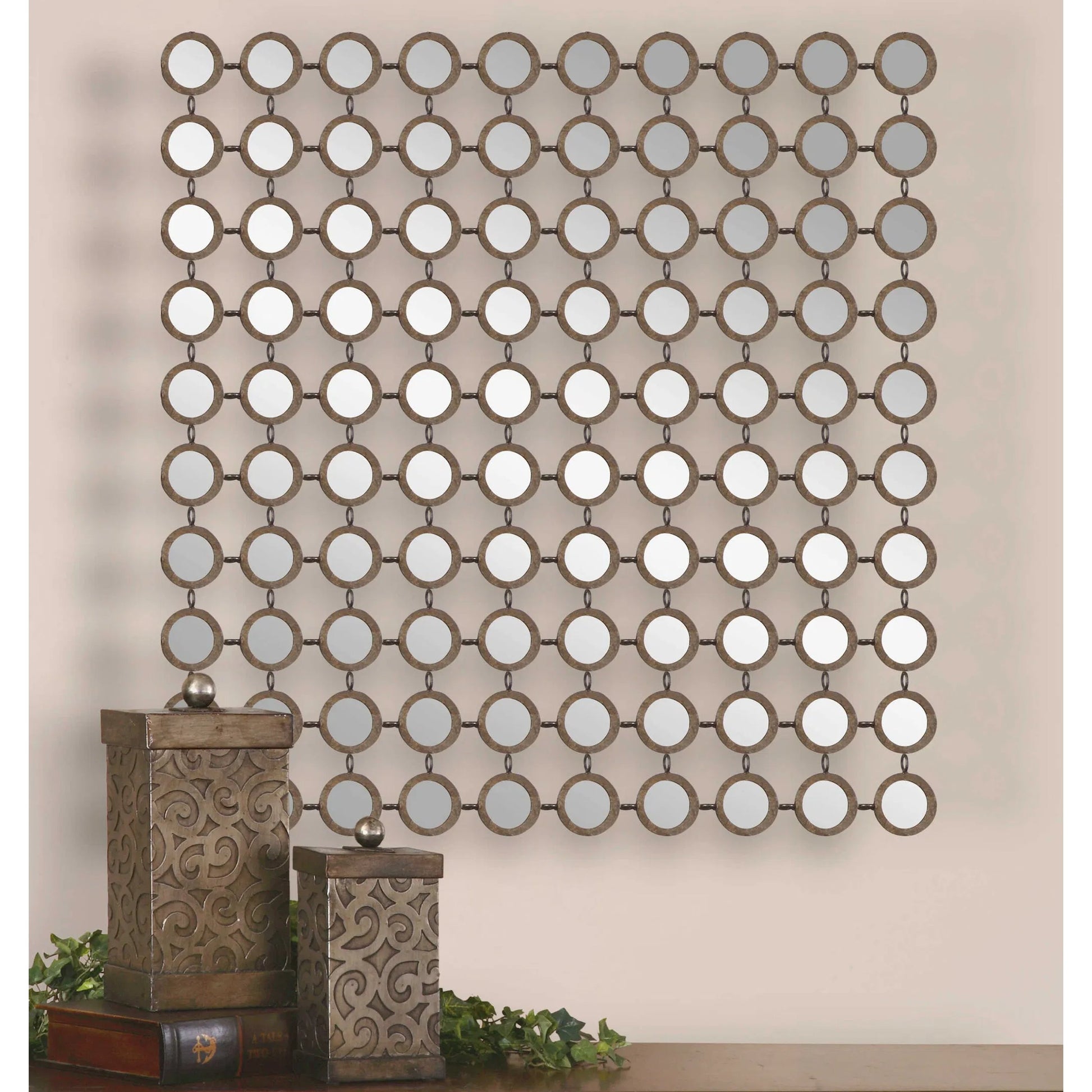 Dinuba Champagne Mirror by Uttermost in silver. Made from metal in a modern style.