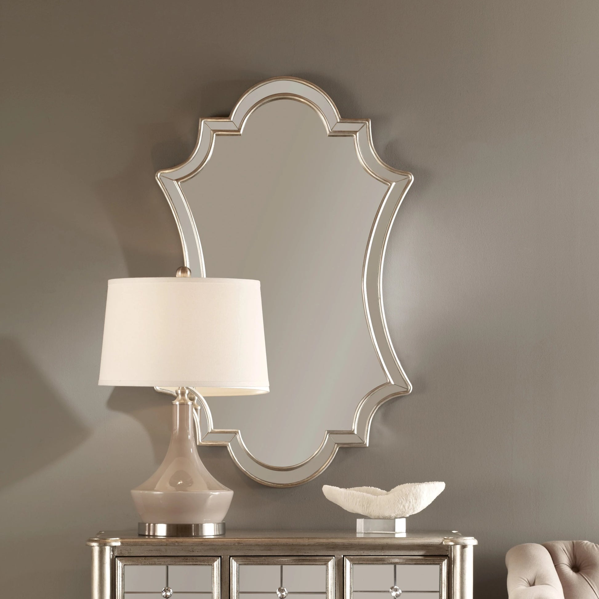 Elara Wall Mirror by Uttermost in silver. Made from pu leather, mdf, glass in a transitional style.