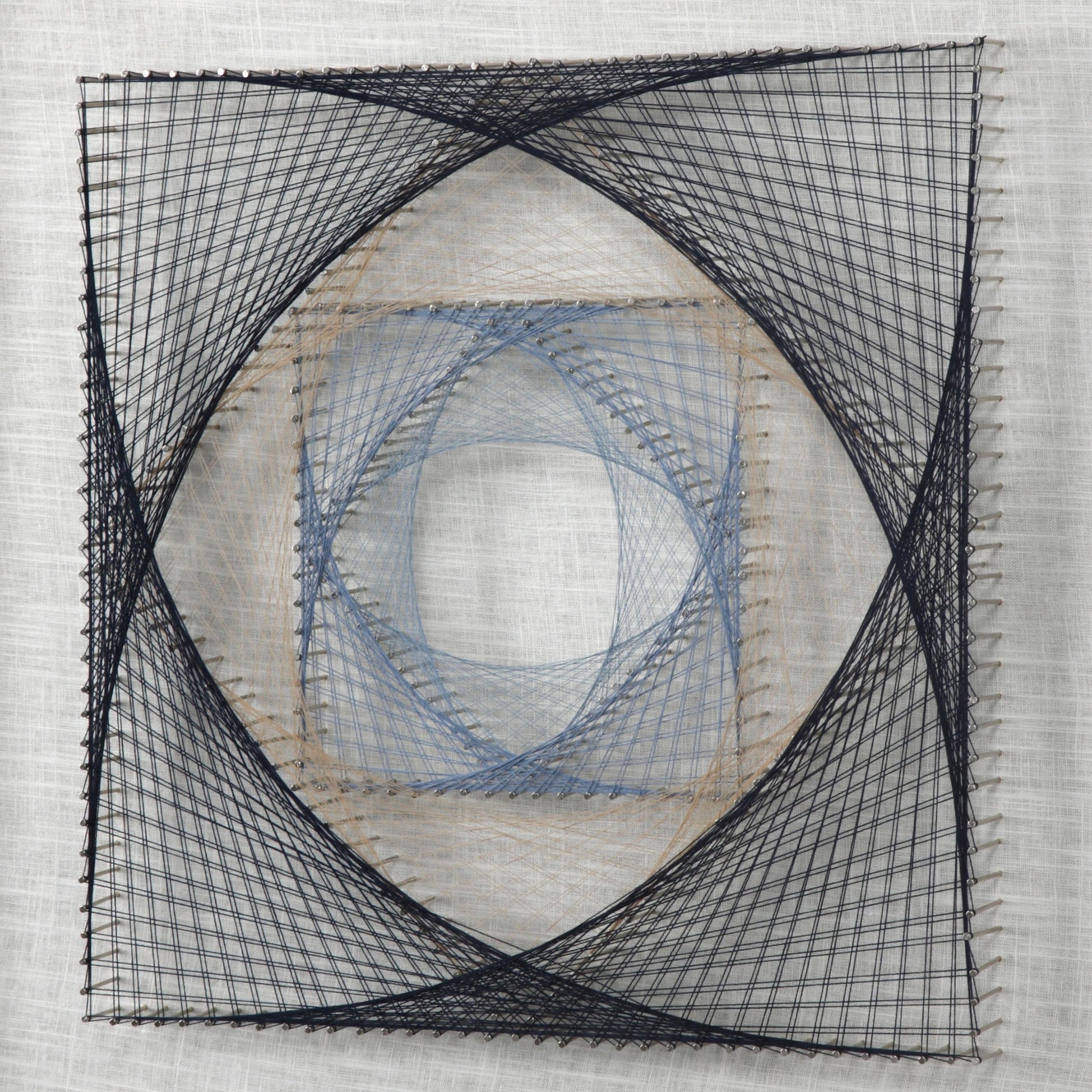 String Duet Geometric Art (Set of 2) by Uttermost in multi. Made from thread, pine, glass, fabric in a modern style.