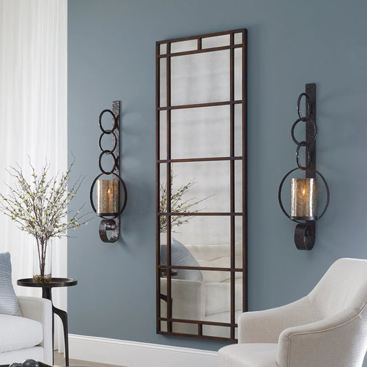 Falconara Metal Wall Sconce by Uttermost in metal. Made from iron, glass in a modern style.