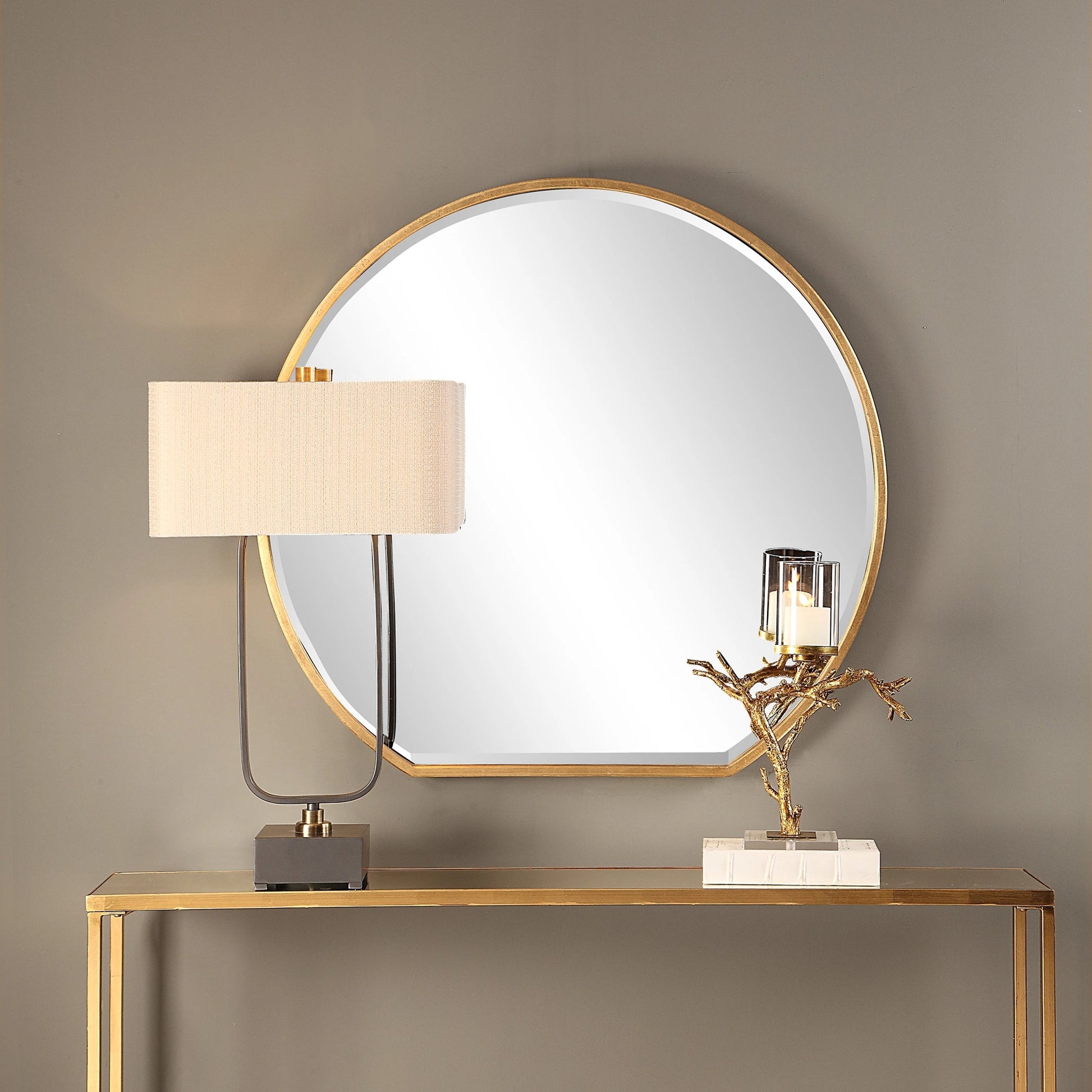 Cabell Mirror by Uttermost in gold. Made from steel, mdf, mirror in a modern style.