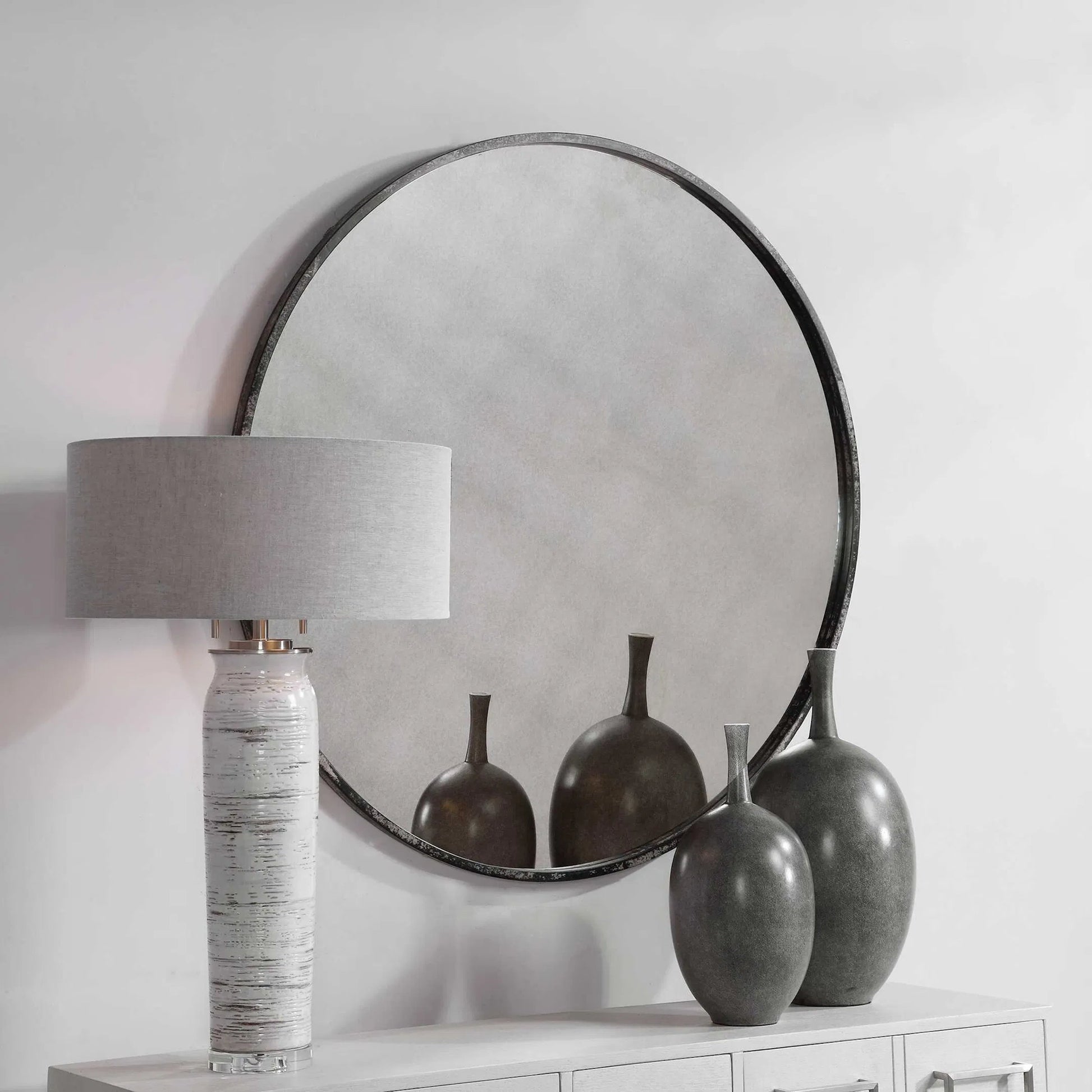 Argand Industrial Round Mirror by Uttermost. Made from metal, mdf, glass in a modern style.
